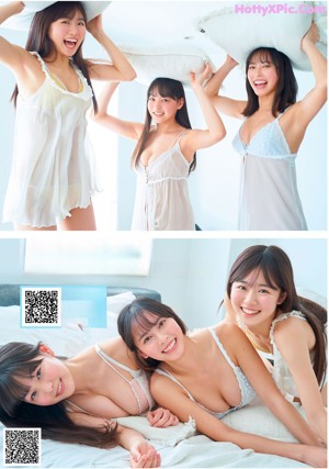 A group of three young women in bikinis posing for a picture.