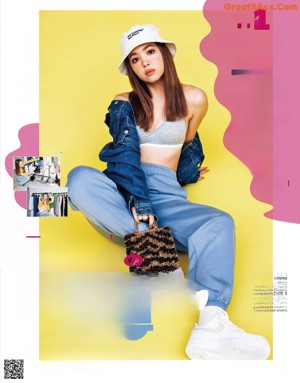 A magazine with a picture of a girl in a yellow sweater.